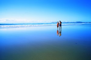 couple walking along beach