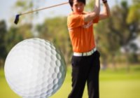 Golfer Hitting Golf Ball Golfer Hitting Golf Ball