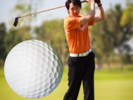 Golfer Hitting Golf Ball Golfer Hitting Golf Ball